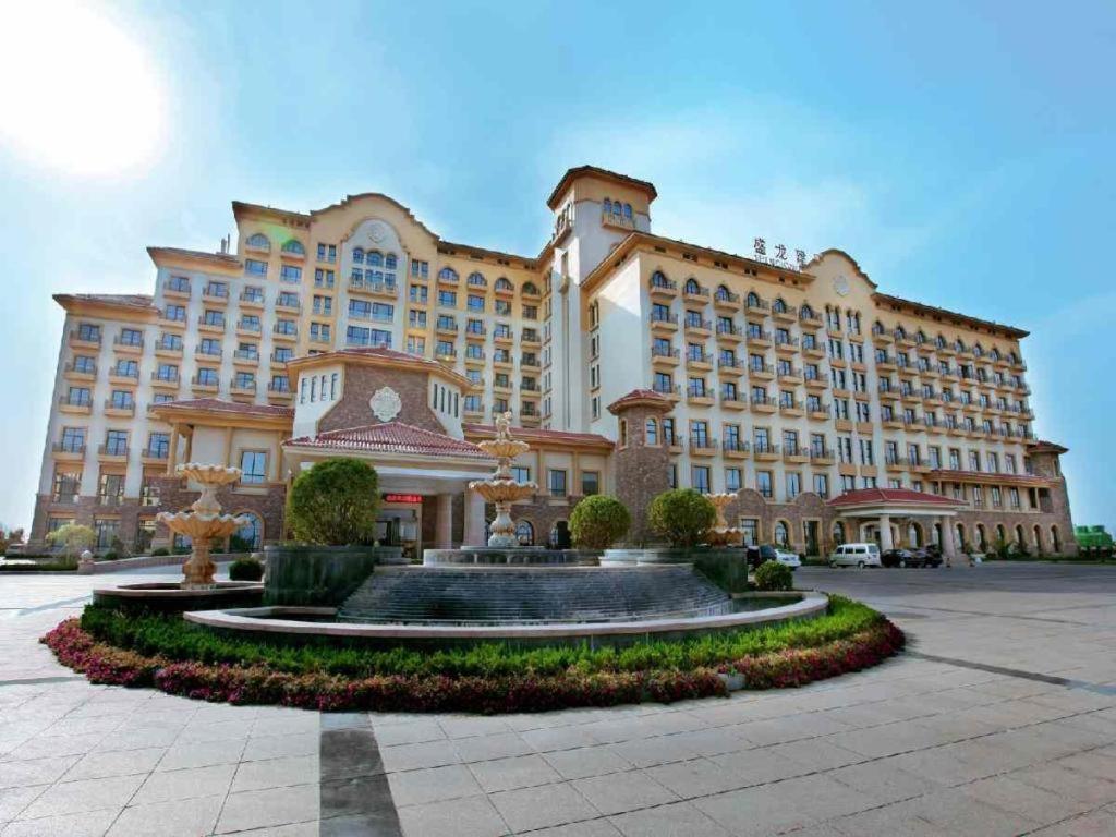 Haiyang Shenglong Jianguo Hotel Fengcheng  Bagian luar foto