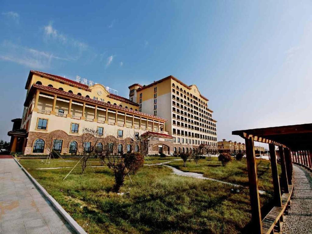 Haiyang Shenglong Jianguo Hotel Fengcheng  Bagian luar foto