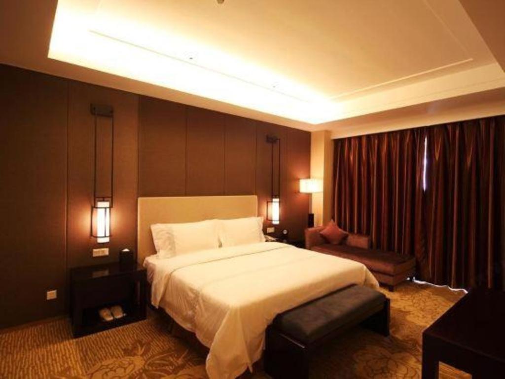 Haiyang Shenglong Jianguo Hotel Fengcheng  Bagian luar foto