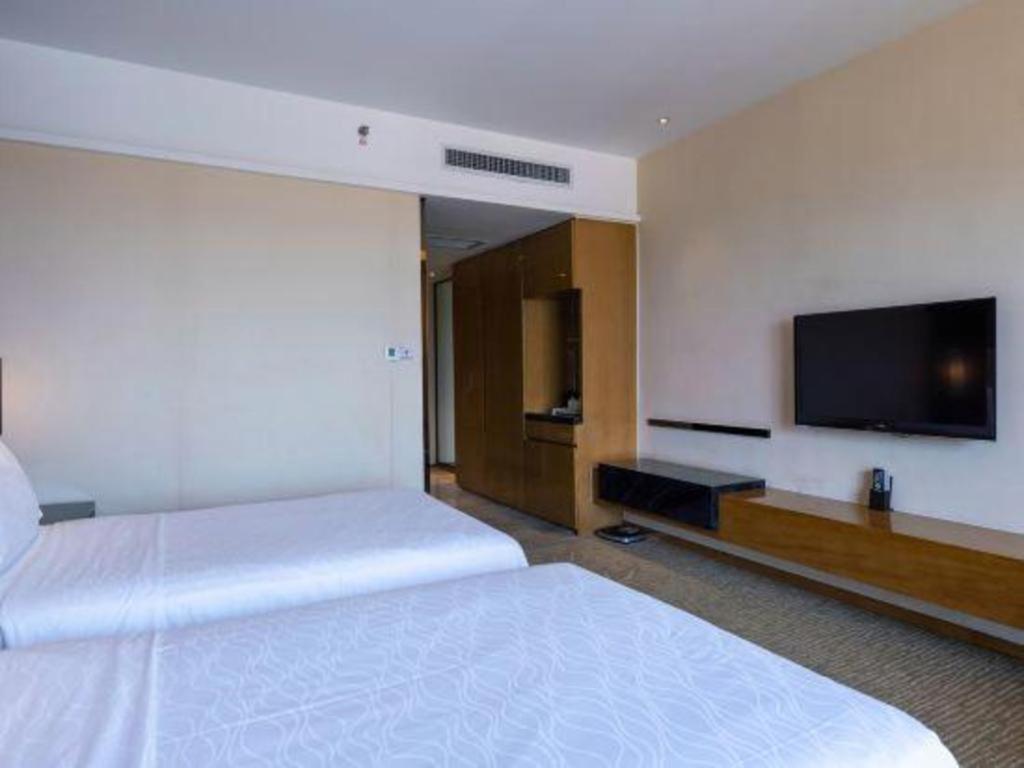 Haiyang Shenglong Jianguo Hotel Fengcheng  Bagian luar foto