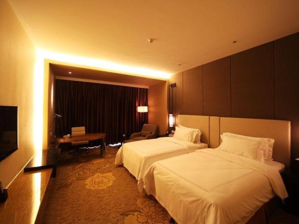 Haiyang Shenglong Jianguo Hotel Fengcheng  Bagian luar foto